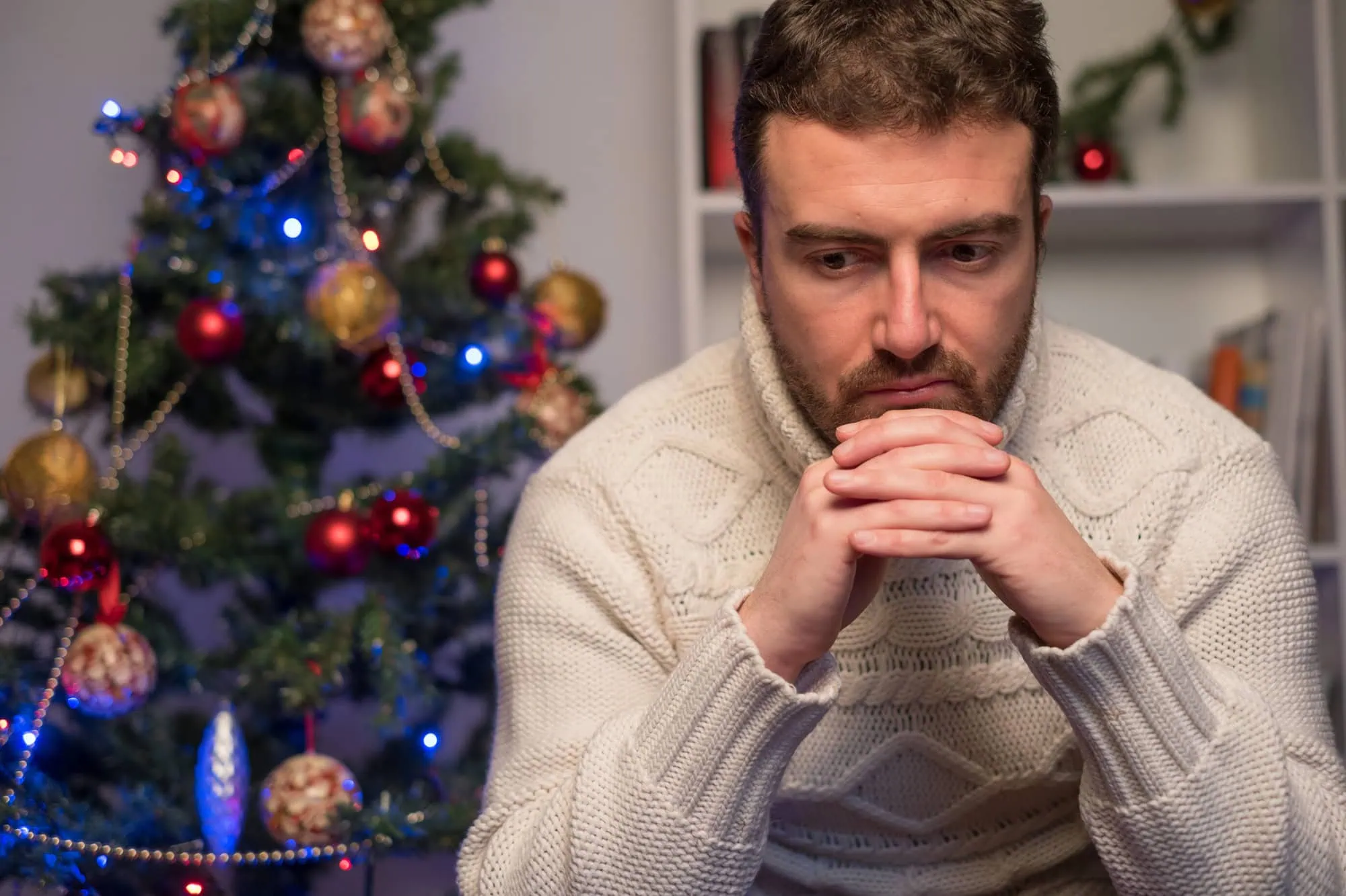 man thinking about treatment during the holidays jpg